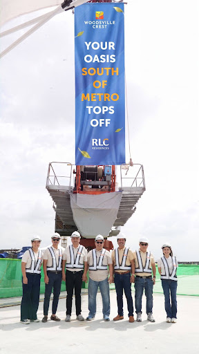 Woodsville Crest Olive Building officially tops off 